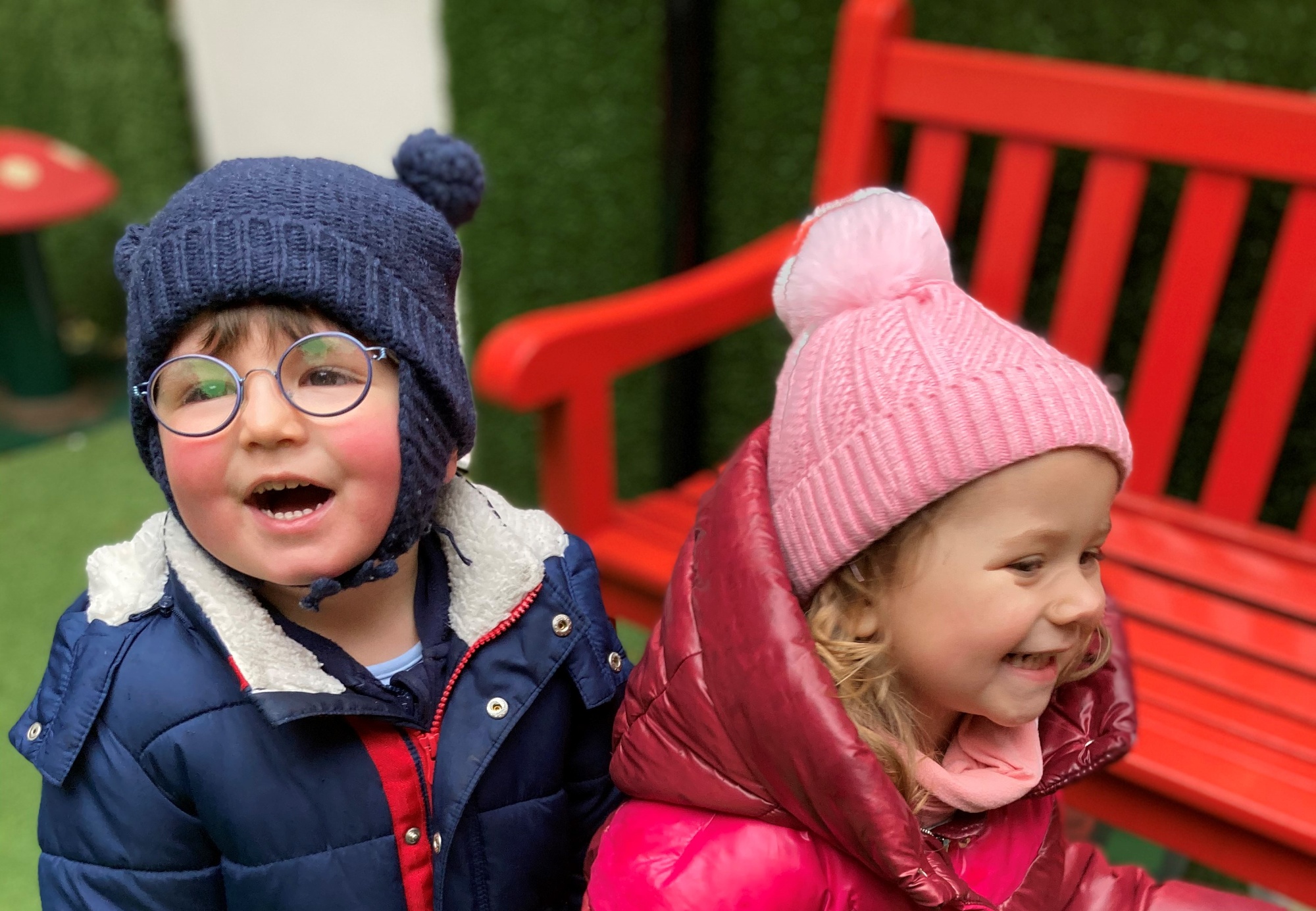 children in hats and coats