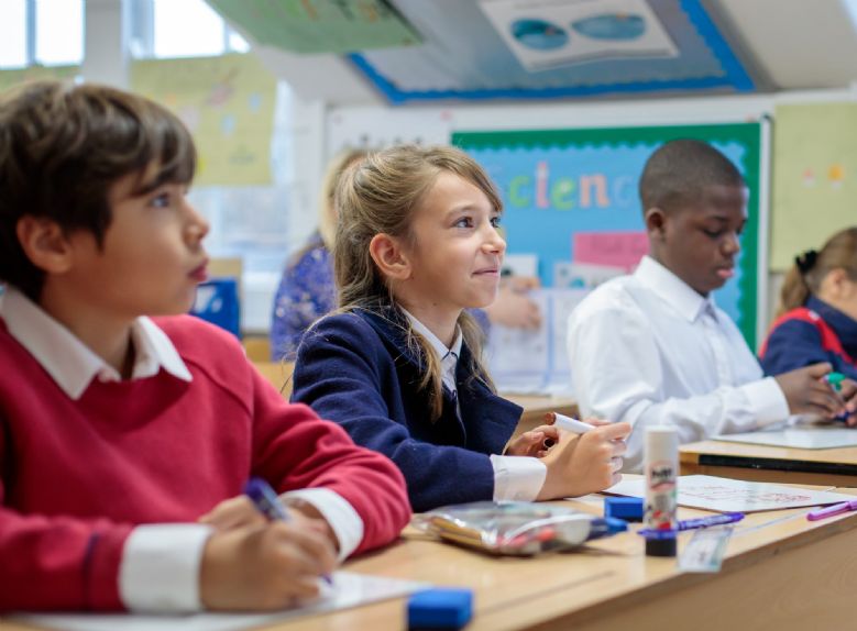 children looking at the board